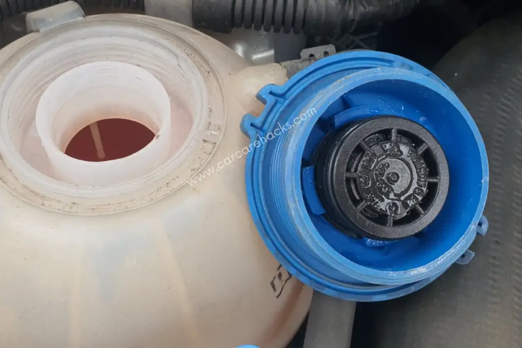 Why Is Coolant Coming Out Of The Overflow Tank [6 Common Causes]