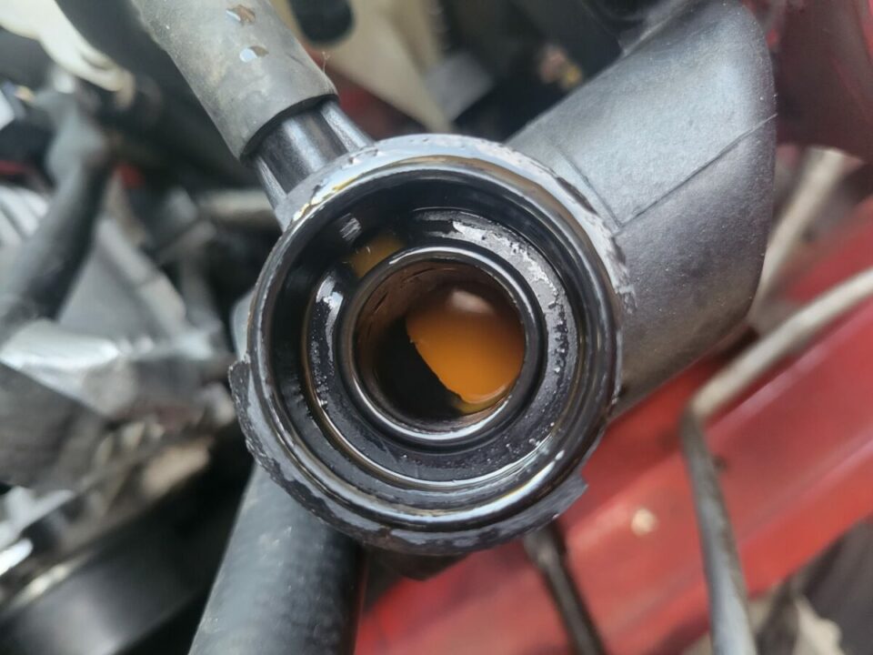 Oil in Coolant Reservoir – Signs, Causes, and Fixes